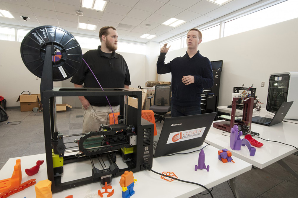 Brad Hord (left) and Owen Phillips have a makerspace up and running at the Watt Family Innovation Center.