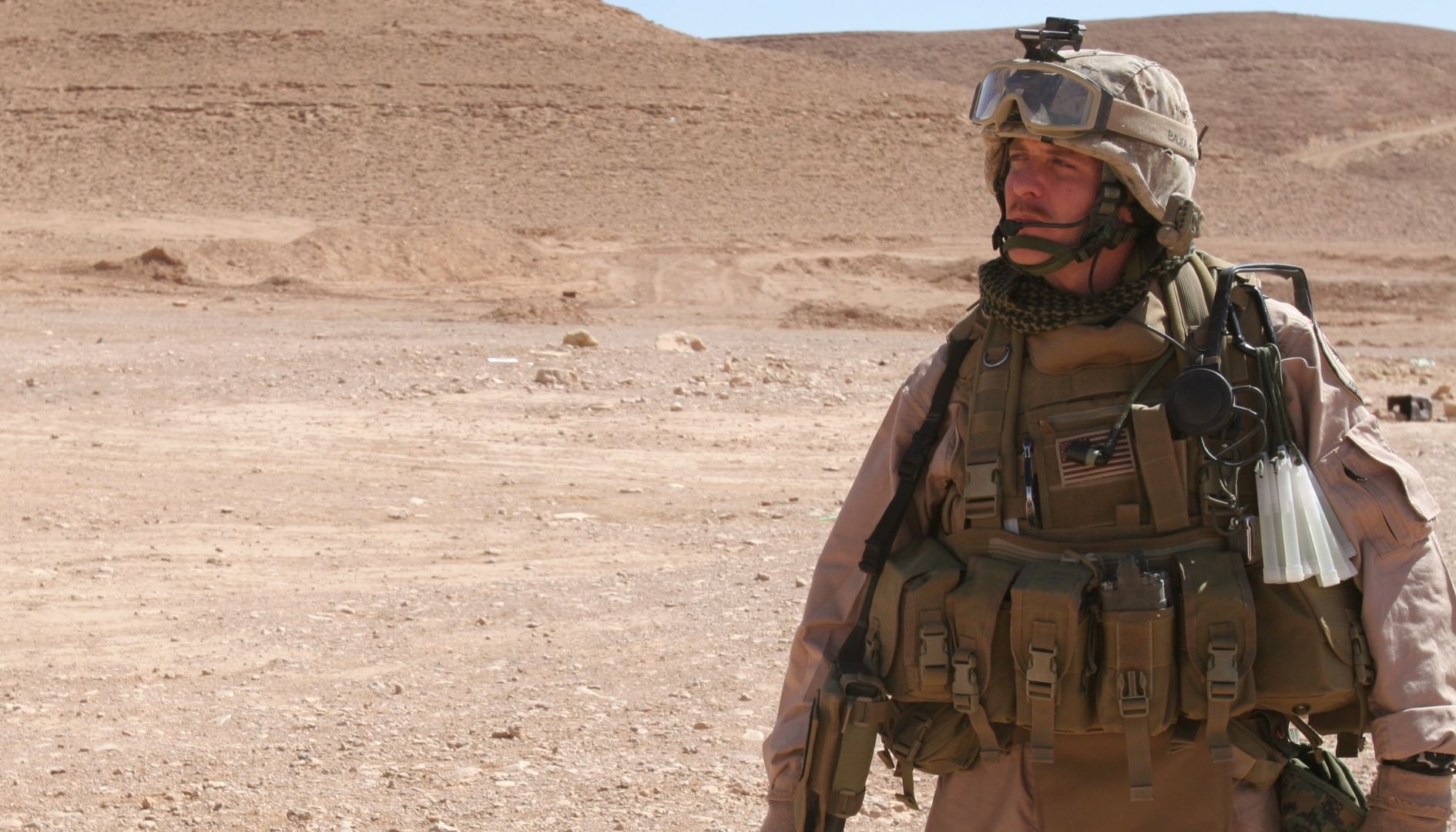 Beau Anthony Bauer standing in the middle of the desert in Iraq